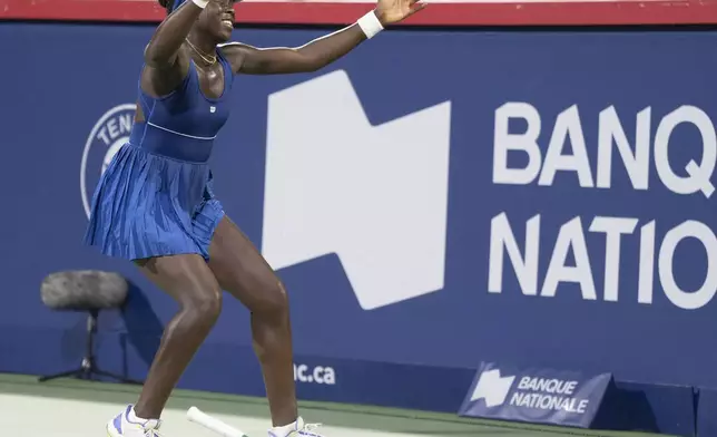 Victoria Mboko of Canada reacts following her win over Elena Rybakina of Kazakhstan during semifinal tennis action at the National Bank Open in Montreal, Wednesday, Aug. 6, 2025. (Christinne Muschi/The Canadian Press via AP)