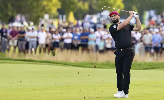 Captain Jon Rahm, of Legion XIII, hits on the 18th hole during the final round of LIV Golf Team Championship Michigan at The Cardinal at Saint John's, Sunday, Aug. 24, 2025, in Plymouth, Mich. (Scott Taetsch/LIV Golf via AP)