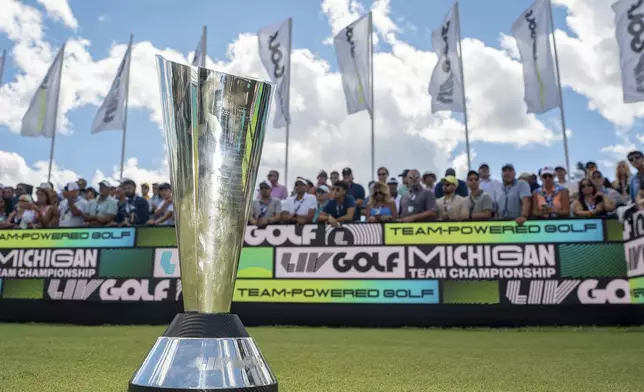 The Team Championship Trophy is displayed on the first tee before the final round of LIV Golf Team Championship Michigan at The Cardinal at Saint John's, Sunday, Aug. 24, 2025, in Plymouth, Mich. (Pedro Salado/LIV Golf via AP)