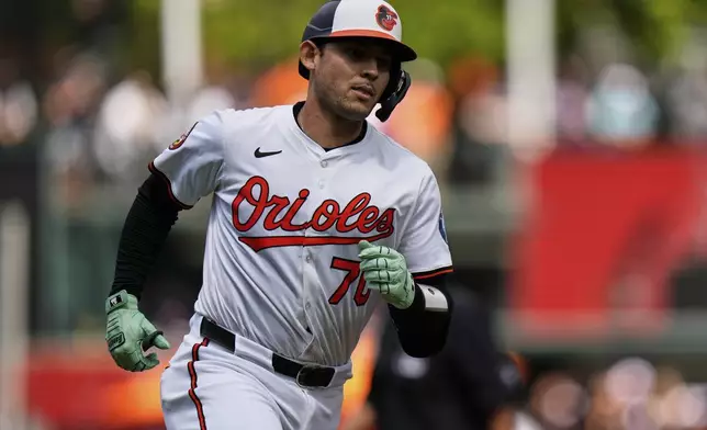 Baltimore Orioles' Alex Jackson (70) rounds the bases after hitting a home run during the third inning of a baseball game against the Boston Red Sox, Thursday, Aug. 28, 2025, in Baltimore. (AP Photo/Stephanie Scarbrough)