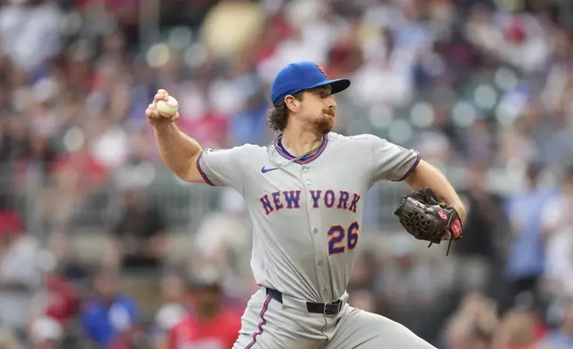 New York Mets pitcher Nolan McLean (26) delivers in the first inning of a baseball game against the Atlanta Braves, Friday, Aug. 22, 2025, in Atlanta. (AP Photo/Brynn Anderson)
