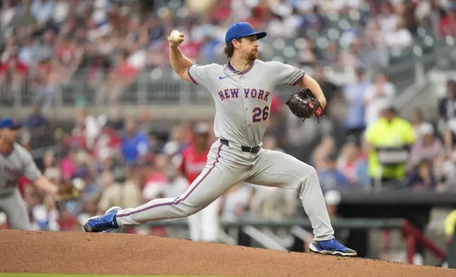 New York Mets pitcher Nolan McLean (26) delivers in the first inning of a baseball game against the Atlanta Braves, Friday, Aug. 22, 2025, in Atlanta. (AP Photo/Brynn Anderson)