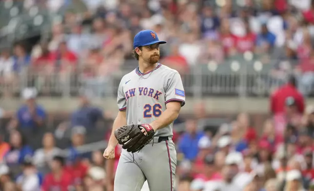 New York Mets pitcher Nolan McLean (26) looks on in the first inning of a baseball game against the Atlanta Braves, Friday, Aug. 22, 2025, in Atlanta. (AP Photo/Brynn Anderson)