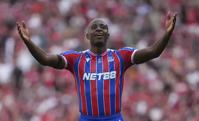 Crystal Palace's Jean-Philippe Mateta reacts after a goal during the FA Community Shield final soccer match between Liverpool and Crystal Palace at Wembley Stadium in London,Sunday, Aug. 10, 2025. (AP Photo/Dave Shopland)