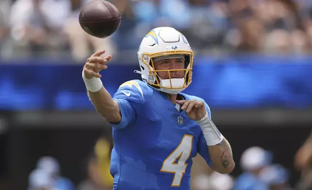 Los Angeles Chargers quarterback Taylor Heinicke (4) throws a pass during the first half of a preseason NFL football game against the New Orleans Saints, Sunday, Aug. 10, 2025, in Inglewood, Calif. (AP Photo/Eric Thayer)