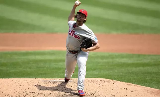 Philadelphia Phillies starting pitcher Aaron Nola throws during the second inning of a baseball game against the Washington Nationals, Sunday, Aug. 17, 2025, in Washington. (AP Photo/Nick Wass)