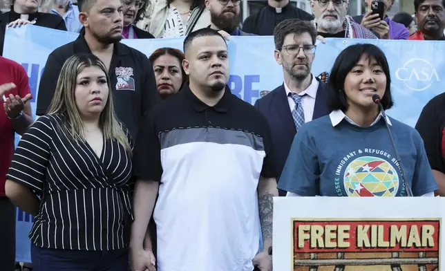 Jennifer Vasquez Sura, front left, wife of Kilmar Abrego Garcia, attends a protest rally at the Immigration and Customs Enforcement field office in Baltimore, Monday, Aug. 25, 2025, to support Kilmar Abrego Garcia. (AP Photo/KT Kanazawich)