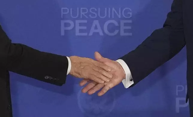 President Donald Trump, right, shakes the hand of Russia's President Vladimir Putin, left, during a joint press conference at Joint Base Elmendorf-Richardson, Alaska, Friday, Aug. 15, 2025. (AP Photo/Jae C. Hong)(AP Photo/Jae C. Hong)