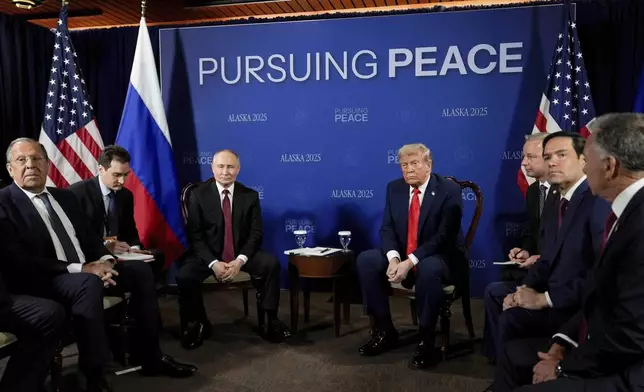President Donald Trump meets with Russia's President Vladimir Putin Friday, Aug. 15, 2025, at Joint Base Elmendorf-Richardson, Alaska. At left is Russia's Foreign Minister Sergey Lavrov and second from right is Secretary of State Marco Rubio. (AP Photo/Julia Demaree Nikhinson)