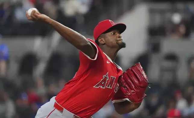 Los Angeles Angels starting pitcher Jose Soriano throws during the first inning of a baseball game against the Texas Rangers, Monday, Aug. 25, 2025, in Arlington, Texas. (AP Photo/LM Otero)