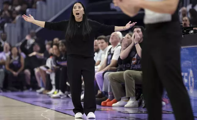 Golden State Valkyries' head coach Natalie Nakase reacts to an official's call in the first half against the Phoenix Mercury during a WNBA basketball game in San Francisco on Tuesday, Aug. 19, 2025. (Scott Strazzante/San Francisco Chronicle via AP)