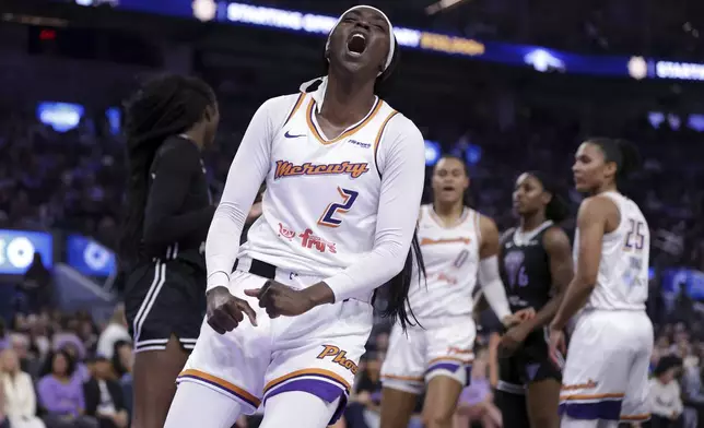 Phoenix Mercury's Kahleah Cooper (2) celebrates a basket and a foul during the first half against the Golden State Valkyries in a WNBA basketball game in San Francisco on Tuesday, Aug. 19, 2025. (Scott Strazzante/San Francisco Chronicle via AP)