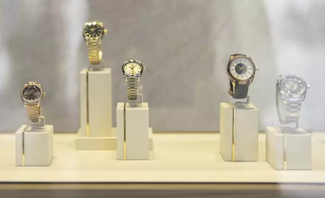 FILE - Watches in the Omega shop window at the Bahnhofsstrasse in Zuerich, Switzerland, on Thursday, April 10, 2025. (Til Buergy/Keystone via AP)