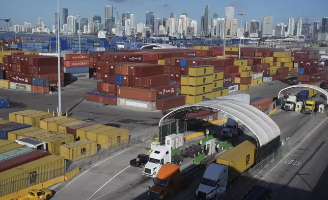 Tractor-trailers line up to enter PortMiami Thursday, Aug. 7, 2025. (AP Photo/Marta Lavandier)