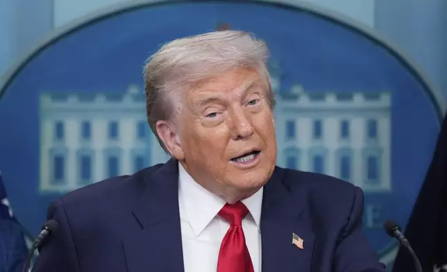 President Donald Trump speaks with reporters in the James Brady Press Briefing Room at the White House, Monday, Aug. 11, 2025, in Washington. (AP Photo/Alex Brandon)