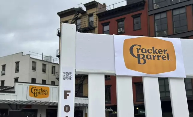 The new Cracker Barrel logo is displayed on Thursday, Aug. 21, 2025, in New York. (AP Photo/Wyatte Grantham-Philips)