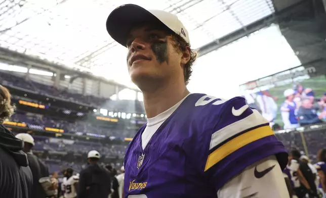 Minnesota Vikings quarterback J.J. McCarthy leaves the field after an NFL preseason football game against the Houston Texans, Saturday, Aug. 9, 2025, in Minneapolis. (AP Photo/Matt Krohn)