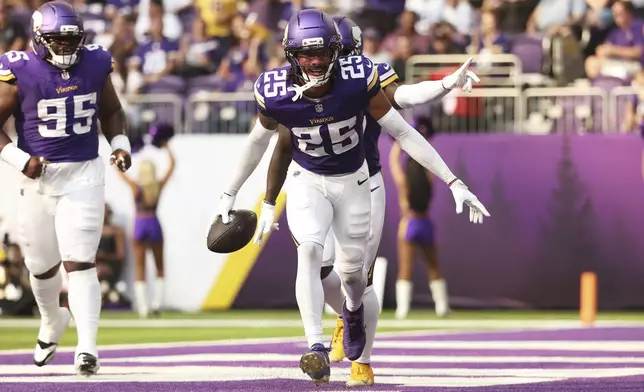 Minnesota Vikings cornerback Kahlef Hailassie (25) celebrates after an interception during the second half of an NFL preseason football game against the Houston Texans, Saturday, Aug. 9, 2025, in Minneapolis. (AP Photo/Matt Krohn)