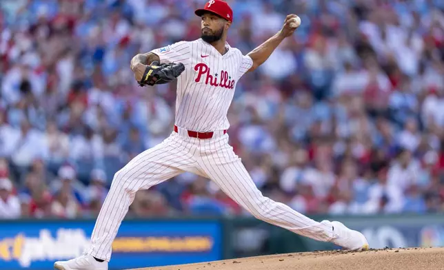 Philadelphia Phillies starting pitcher Cristopher Sanchez delivers during the first inning of a baseball game against the Atlanta Braves, Saturday, Aug. 30, 2025, in Philadelphia. (AP Photo/Chris Szagola)