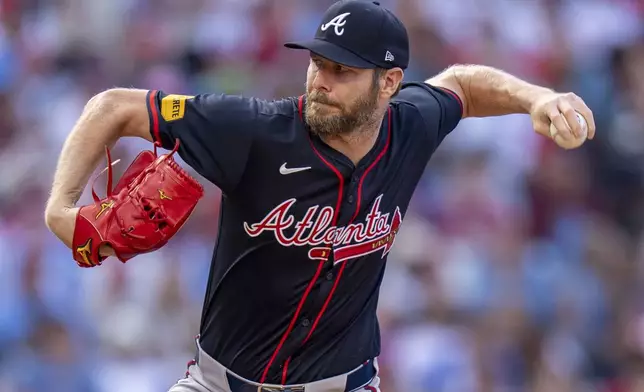 Atlanta Braves starting pitcher Chris Sale delivers during the first inning of a baseball game against the Philadelphia Phillies, Saturday, Aug. 30, 2025, in Philadelphia. (AP Photo/Chris Szagola)