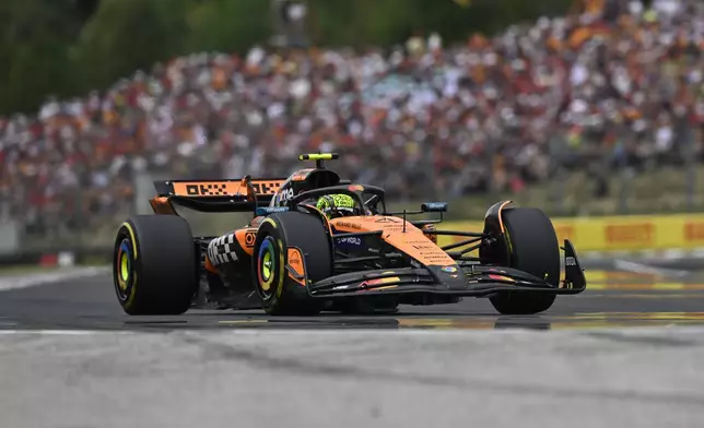 McLaren driver Lando Norris of Britain steers his car during the Hungarian Formula One Grand Prix race at the Hungaroring racetrack in Mogyorod, Hungary, Sunday, Aug. 3, 2025. (AP Photo/Denes Erdos)