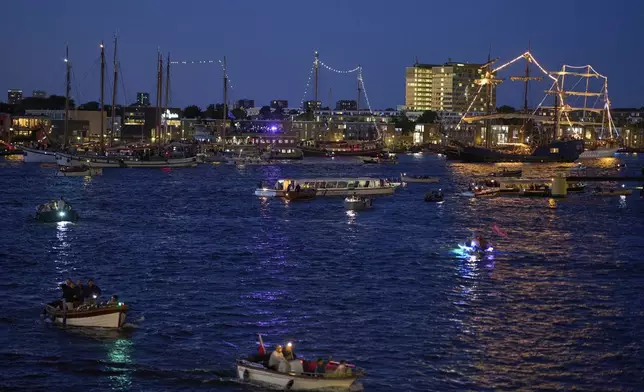 Hundreds of tall ships sailed into the Dutch capital's harbor for the 10th edition of SAIL, in Amsterdam, Netherlands, Wednesday, Aug. 20, 2025. (AP Photo/Peter Dejong)