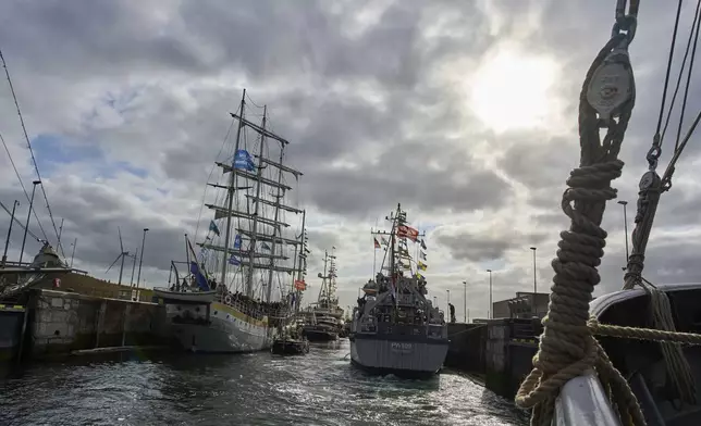 Hundreds of tall ships sailed into the Dutch capital's harbor for the 10th edition of SAIL, in Amsterdam, Netherlands, Wednesday, Aug. 20, 2025. (AP Photo/Peter Dejong)