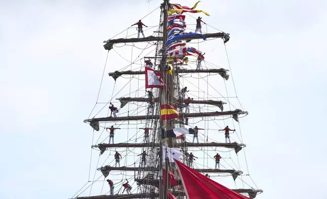 Hundreds of tall ships sailed into the Dutch capital's harbor for the 10th edition of SAIL, in Amsterdam, Netherlands, Wednesday, Aug. 20, 2025. (AP Photo/Peter Dejong)