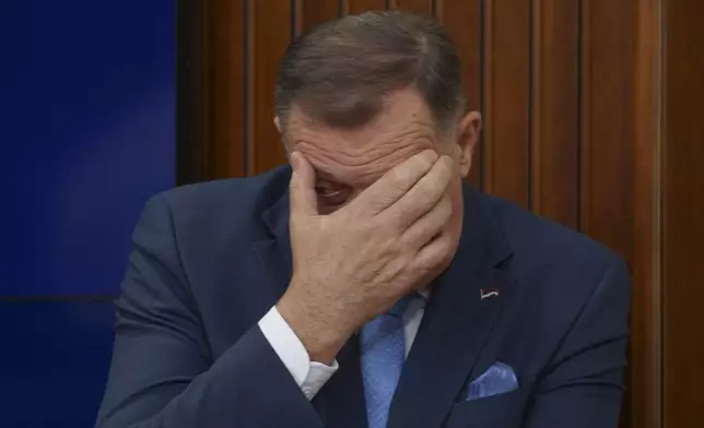 FILE - Bosnian Serb President Milorad Dodik gestures during a news conference after Bosnian prosecutors ordered the detention of three top Bosnian Serb officials over a series of separatist actions, in the Bosnian town of Banja Luka, 240 kms northwest of Sarajevo, Wednesday, March 12, 2025. (AP Photo/Radivoje Pavicic, File)