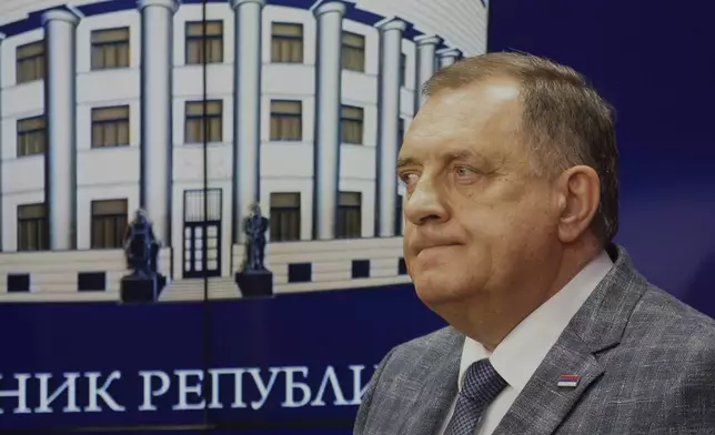 Bosnian Serb President Milorad Dodik looks on during a press conference after an appeals court in Bosnia-Herzegovina confirmed an earlier court ruling that sentenced to one year in prison and banned him from politics for six years over his separatist actions, in the Bosnian town of Banja Luka, 240 kms northwest of Sarajevo, Friday, August. 1, 2025. (AP Photo/Radivoje Pavicic)