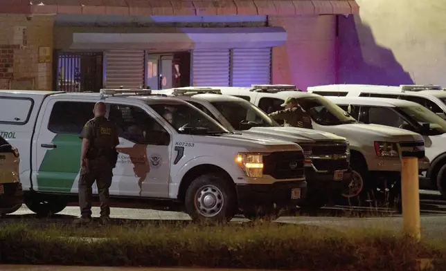 Agents with U.S. Customs and Border Protection as well as Metropolitan Police get into their vehicles to continue patrolling Washington, Wednesday, Aug. 13, 2025, in northwest Washington on Kennedy St. NW. (AP Photo/Jacquelyn Martin)