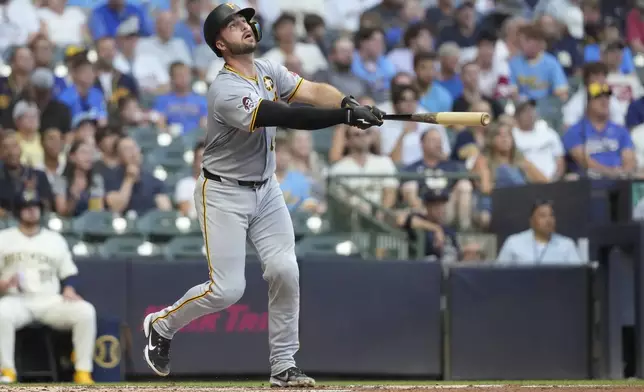 Pittsburgh Pirates' Joey Bart hits a solo home run during the third inning of a baseball game against the Milwaukee Brewers, Monday, Aug. 11, 2025, in Milwaukee. (AP Photo/Aaron Gash)