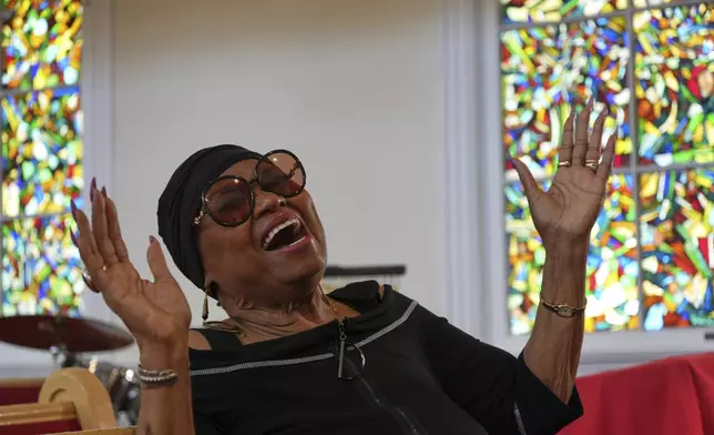 Singer and actress Marlena Smalls sings a Gullah spiritual at the Tabernacle Baptist Church in Beaufort, South Carolina, Saturday, July 19, 2025. (AP Photo/Luis Andres Henao)