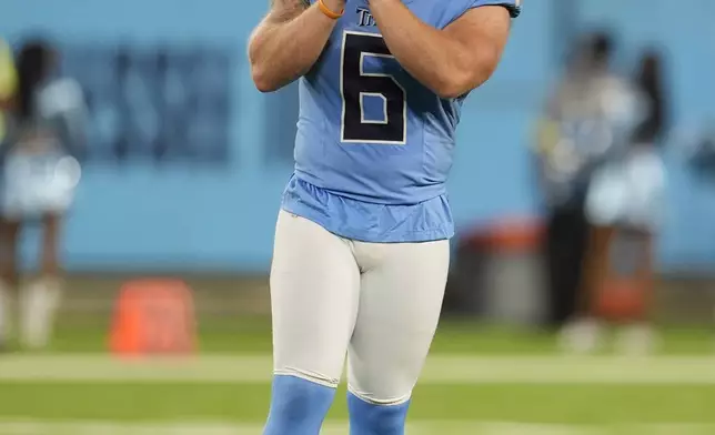 Tennessee Titans place-kicker Joey Slye (6) celebrates after a field goal against the Minnesota Vikings during the second half of a preseason NFL football game, Friday, Aug. 22, 2025, in Nashville, Tenn. (AP Photo/George Walker IV)
