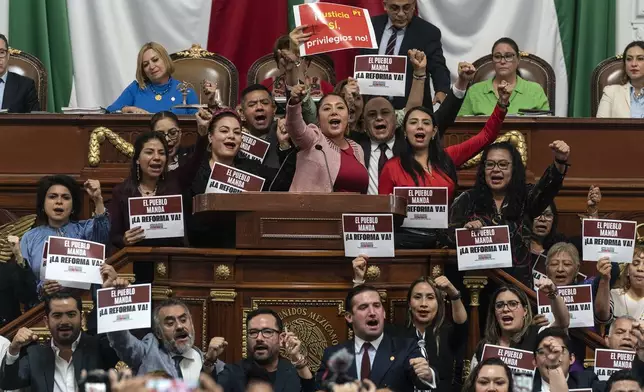 FILE - Legislators rally in favor of judicial reform at Congress in Mexico City, Sept. 12, 2024. (AP Photo/Felix Marquez, File)