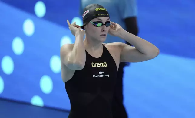 Marrit Steenbergen of Netherlands prepares to compete in the women's 100-meter freestyle final at the World Aquatics Championships in Singapore, Friday, Aug.1, 2025. (AP Photo/Lee Jin-man)