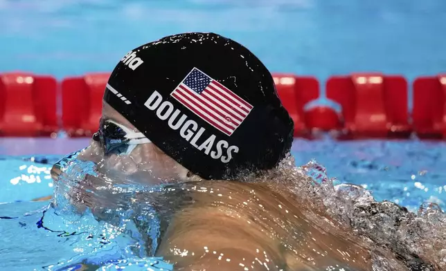 Kate Douglass of the United States competes in the women's 200-meter breaststroke final at the World Aquatics Championships in Singapore, Friday, Aug.1, 2025. (AP Photo/Vincent Thian)