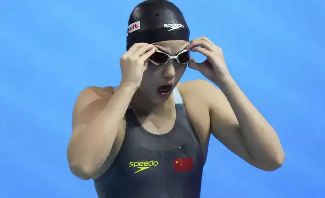 Yu Zidi of China prepares to compete in the women's 200-meter butterfly final at the World Aquatics Championships in Singapore, Thursday, July 31, 2025. (AP Photo/Lee Jin-man)