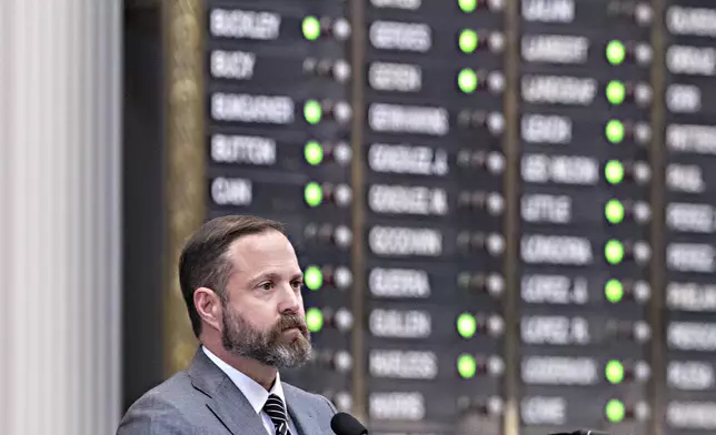 Texas House Speaker Dustin Burrows looks on during a roll call in the State Capitol, Tuesday, Aug. 5, 2025, in Austin, Texas. (AP Photo/Rodolfo Gonzalez)