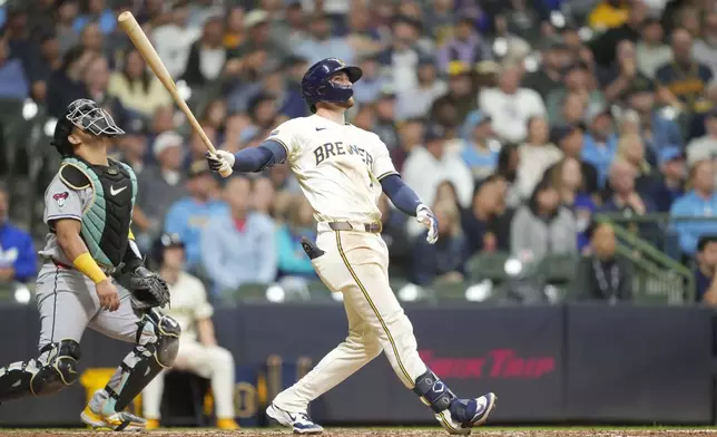 Milwaukee Brewers' Brice Turang (2) hits a two-run home run during the sixth inning of a baseball game against the Arizona Diamondbacks Tuesday, Aug. 26, 2025, in Milwaukee. (AP Photo/Kayla Wolf)