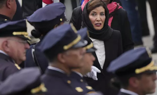 New York Gov. Kathy Hochul attends the funeral for New York Police officer Didarul Islam, Thursday, July 31, 2025, in New York. (AP Photo/Angelina Katsanis)