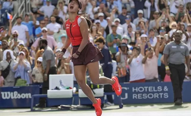 Alexandra Eala, of the Philippines, reacts after defeating Clara Tauson, of Denmark, during the first round of the US Open tennis championships, Sunday, Aug. 24, 2025, in New York. (AP Photo/Seth Wenig)