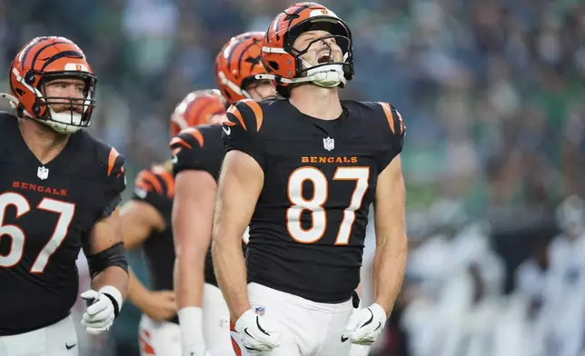 Cincinnati Bengals tight end Tanner Hudson (87) reacts after an extra point following his touchdown during the first half of an NFL preseason football game against the Philadelphia Eagles on Thursday, Aug. 7, 2025, in Philadelphia. (AP Photo/Chris Szagola)