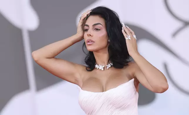 FILE - Georgina Rodriguez poses for photographers upon arrival for the premiere of the film 'Queer' during the 81st edition of the Venice Film Festival in Venice, Italy, on Tuesday, Sept. 3, 2024. (Photo by Vianney Le Caer/Invision/AP, File)