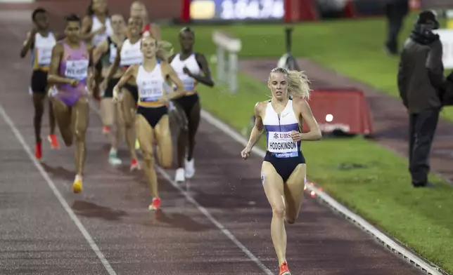 Keely Hodgkinson, front, of Great Britain in action during the women's 800m race at the Wanda Diamond League 'Athletissima Lausanne' athletics meeting in Lausanne, Switzerland, Wednesday, Aug. 20, 2025. (Martial Trezzini/Keystone via AP)