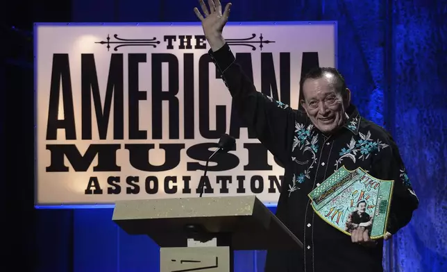 FILE - Flaco Jimenez accepts the Lifetime Achievement for Instrumentalist Award during the Americana Music Honors and Awards show Wednesday, Sept. 17, 2014, in Nashville, Tenn. (AP Photo/Mark Zaleski, File)