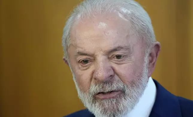 Brazil's President Luiz Inacio Lula da Silva gives a joint statement with Nigeria's President Bola Tinubu, at Planalto presidential palace, in Brasilia, Brazil, Monday, Aug. 25, 2025. (AP Photo/Eraldo Peres)