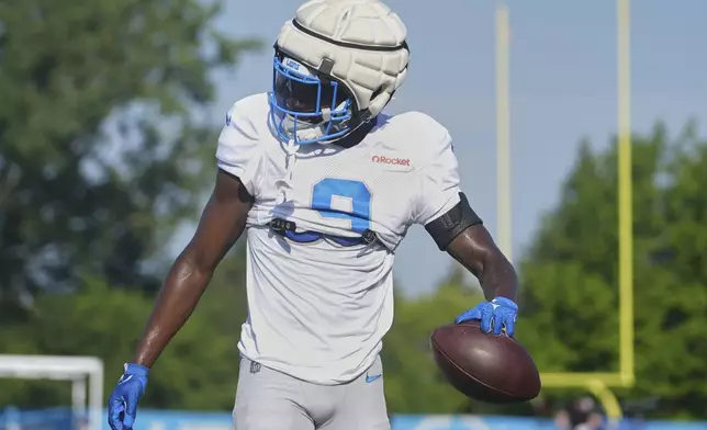 Detroit Lions cornerback Ennis Rakestraw Jr. runs drills during an NFL football practice Monday, July 28, 2025, in Allen Park, Mich. (AP Photo/Ryan Sun)