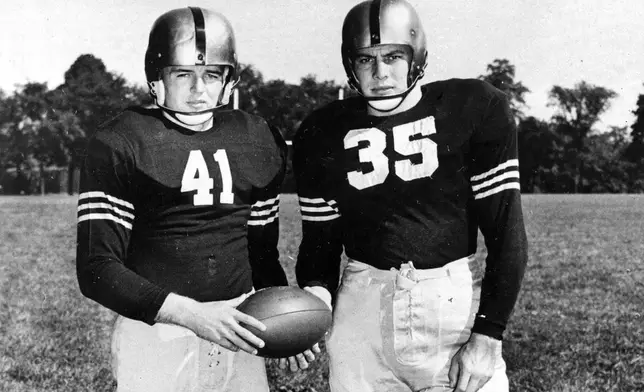 FILE - Army backs Glenn Davis (41) and Felix "Doc" Blanchard (35) pose in New York City in 1946, after they are named to the Associated Press 1946 All-American eleven for their third consecutive time. (AP Photo/File)