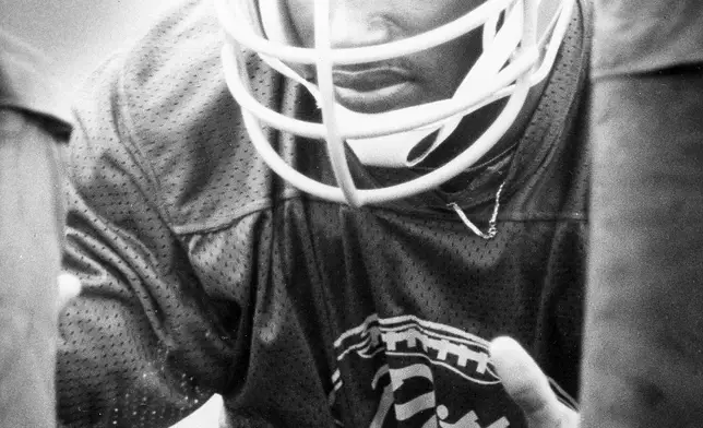 FILE - Senior All-American defensive end Hugh Green prepares to hit a blocking sled as workouts began for the University of Pittsburgh NCAA college football team at Edinboro State College in Edinboro, Pa., Aug. 23, 1980. (AP Photo/WCR, File)